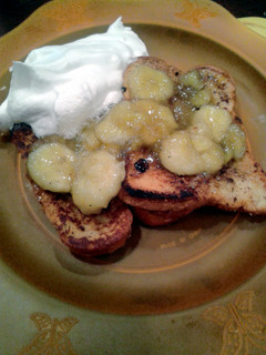 A picture of Sugar crusted cinnamon french Toast with banana foster carmel.