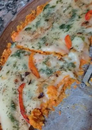Una foto de Pizza de zanahoria con queso de papa