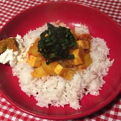 A picture of Paneer and potato curry.