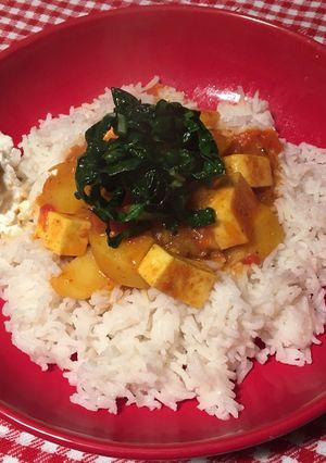 A picture of Paneer and potato curry.