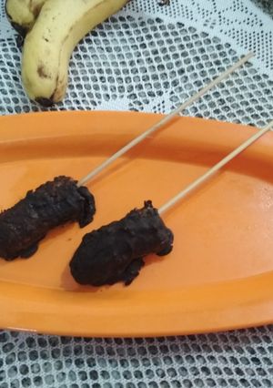 A picture of Chocolate coated banana pops.