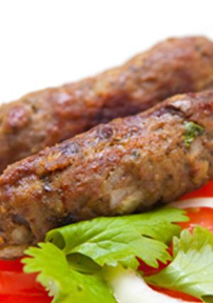A picture of Grilled Kofta with Pomegranate Molasses.