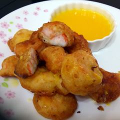A picture of Beer Batter Prawn With Sauce Orange.