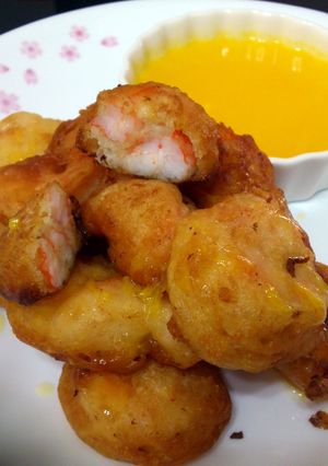 A picture of Beer Batter Prawn With Sauce Orange.