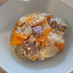 A picture of 一锅煮金瓜排骨饭 One-Pot Pork Ribs Pumpkin Rice.