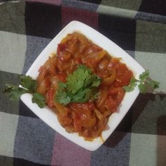 A picture of Pyaz tamatar with cream.