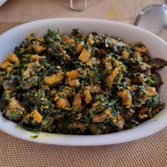 Fenugreek leaves and brinjals stir-fry (Methi ringan nu shak) A picture of Fenugreek leaves and brinjals stir-fry (Methi ringan nu shak).