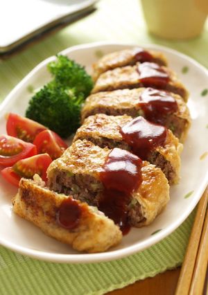 A picture of Pan Fried Ground Meat Cutlet Stuffed In Fried Tofu Skin.