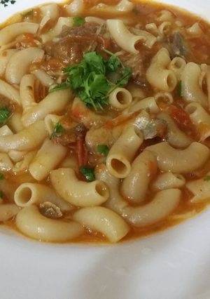 A picture of Pasta in meat and tomato sauce.