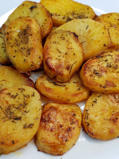 Una foto de Patatas al vino