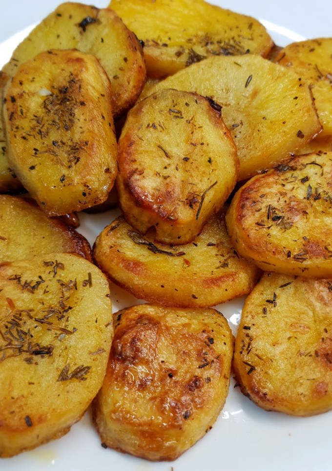 Una foto de Patatas al vino
