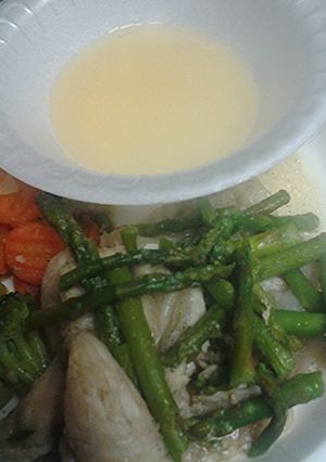 A picture of Swai and asparagus.