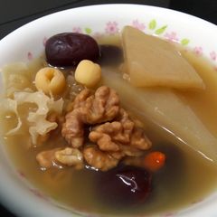 A picture of Walnut And Lotus Seeds Vegetarian Winter Melon Soup.