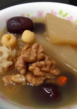 A picture of Walnut And Lotus Seeds Vegetarian Winter Melon Soup.