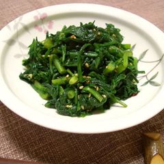 A picture of Aromatic Chrysanthemum Leaves with Garlic.