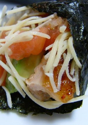 A picture of Unique Hand Rolls Avocado and Chicken with Salsa.