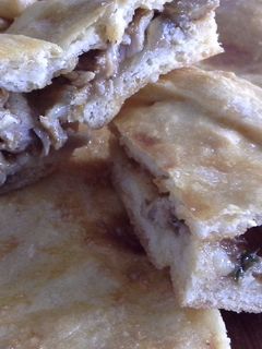 Una foto de Empanada de solomillo adobado