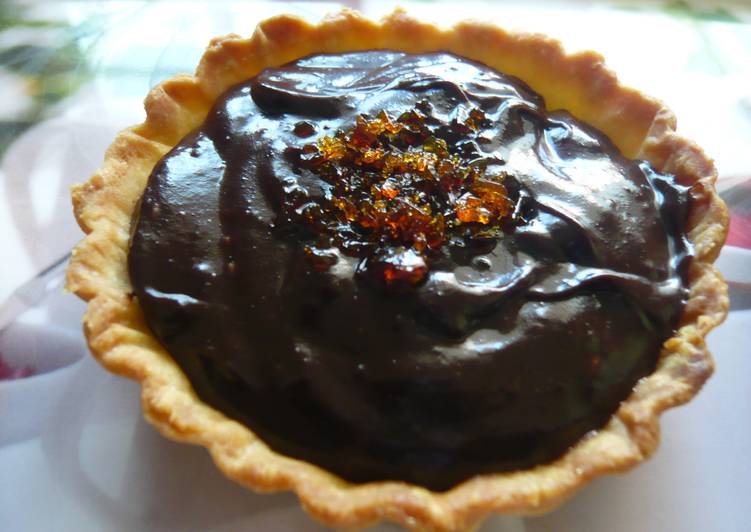 Bittersweet Chocolate pudding and praline tartlets