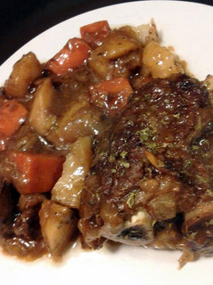 A picture of Beef back ribs n veggies.