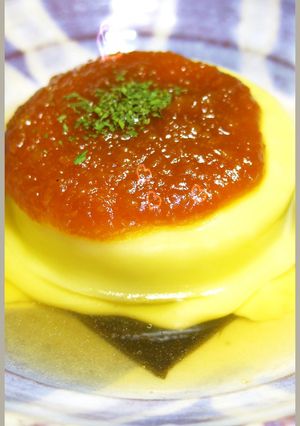A picture of Furofuki Daikon Topped with Cheese.