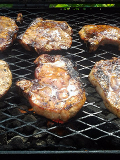 A picture of grilled pork chops with guava glaze.