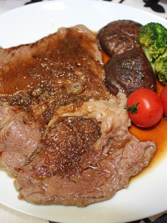 A picture of Beef Steak with Delicious Sauce.