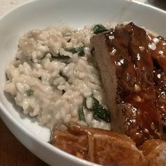 A picture of Marinated Pork Fillet on risotto.