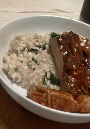 A picture of Marinated Pork Fillet on risotto.