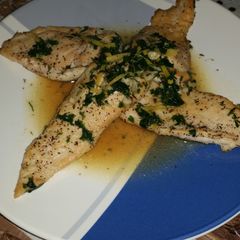 A picture of Seared Chicken Breast with Lemon Herb Pan Sauce.