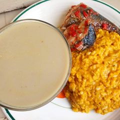 A picture of Ukwa with fried fish.