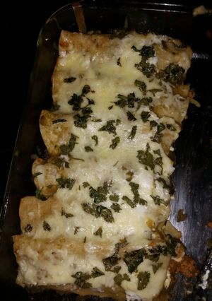 A picture of Turkey enchiladas suiza.