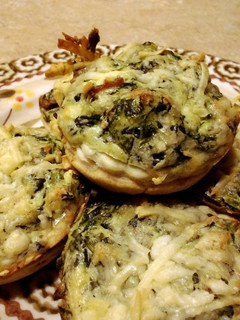 A picture of Spinach ,bacon and cheese cup appetizers.