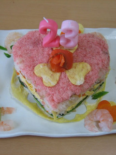 A picture of Sushi Cake for Celebratory Events.