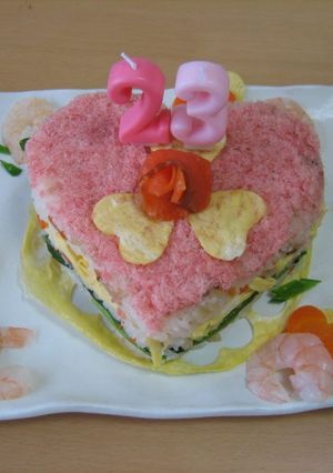 A picture of Sushi Cake for Celebratory Events.
