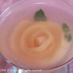 A picture of Rose Jello with Peach Compote.
