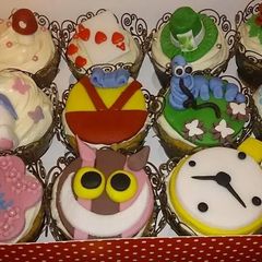 A picture of Alice in wonderland cupcakes.