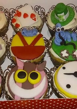 A picture of Alice in wonderland cupcakes.