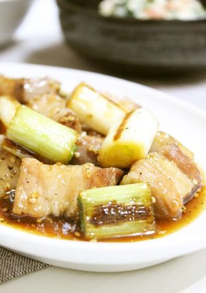 A picture of Excellent Pork Belly Block & Japanese Leek in Delicious Sauce.
