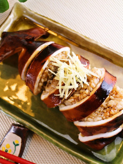 A picture of Ultra-Easy Plump Squid Stuffed with Rice (Ikameshi) and Teriyaki-Style Sauce.