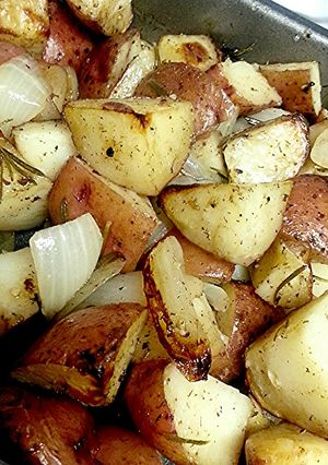 A picture of Rosemary Roasted Potatoes & Onions.