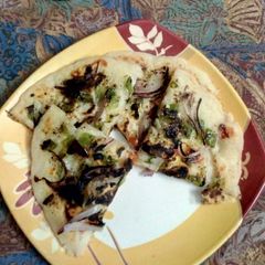 A picture of Suji Uttapam.