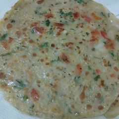 A picture of Egg and Tomato 🍅 Paratha 👌.
