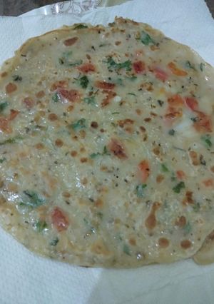 A picture of Egg and Tomato 🍅 Paratha 👌.