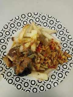 A picture of Fried Yam, egg sauce n fish.