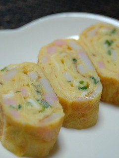 A picture of Rolled Omelette with Kamaboko Fish Cakes and Green Onions for Lunchboxes.