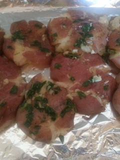 A picture of Herbed smashed potatoes.