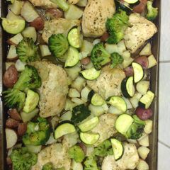 A picture of Roasted Chicken, Potatoes & Veggies.