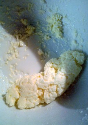 A picture of homemade butter and butter milk.