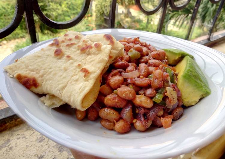 Coconut cumin beans with Naan bread