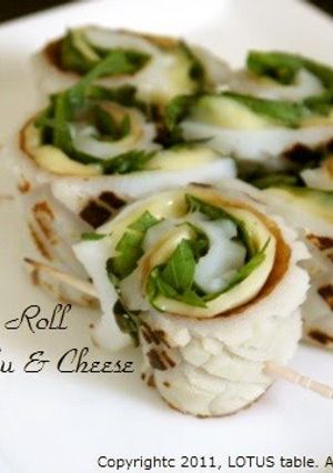 A picture of Chrysanthemum Greens and Cheese Rolled in Chikuwa Fish Sticks.